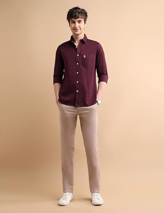 U.S. Polo Assn. men's regular fit solid cotton shirt with cutaway collar, long sleeves and two chest pockets